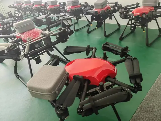 Red HXC cleaning drones with carry cases at the facility