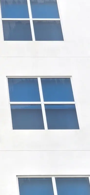 Close-up of clean windows on a white façade