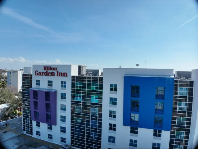 Aerial view of the hotel with the Hilton Garden Inn tower behind