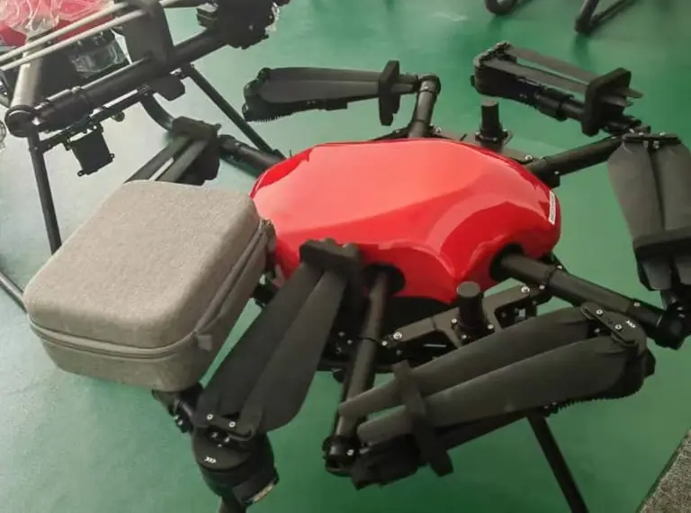 Red Strato commercial cleaning drone with its carry case